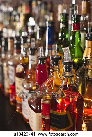 Stock Image - Bottles of liquor. Fotosearch