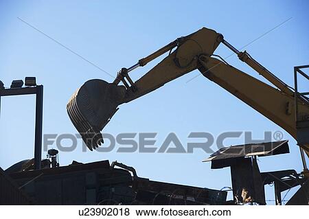 Stock Photo - Bucket loader working. Fotosearch