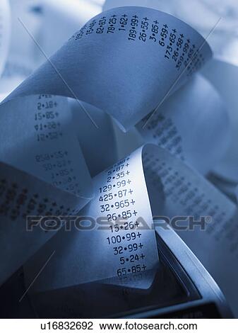 Stock Image - Calculator and receipts. Fotosearch