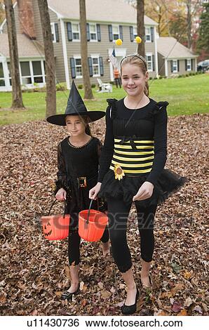 Stock Photograph - Children dressed up for Halloween. Fotosearch