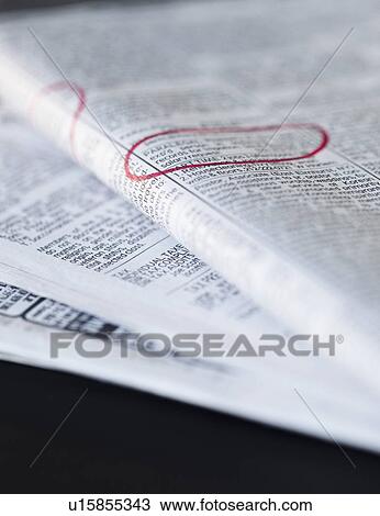 Stock Image - Classified Ads in newspaper. Fotosearch