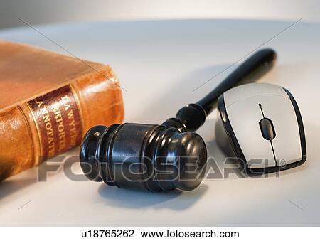 Stock Image - Computer mouse and gavel. Fotosearch