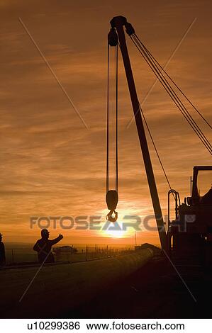 Stock Photograph - Construction work on pipeline. Fotosearch