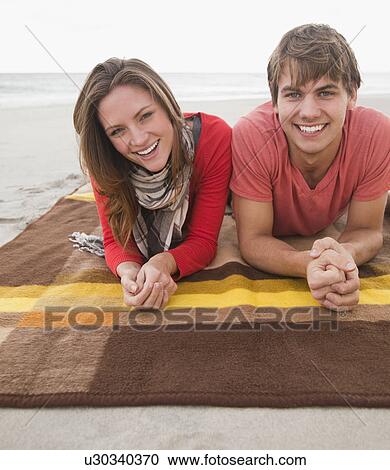 Couple at the beach View Large Photo Image Stock Image - Couple at the beach. Fotosearch