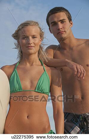 Stock Photography - Couple at the beach. Fotosearch