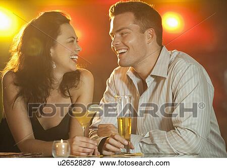 Stock Photo - Couple drinking. Fotosearch
