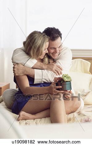 Stock Image - Couple embracing. Fotosearch