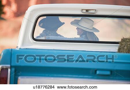 Couple in truck View Large Photo Image Picture - Couple in truck. Fotosearch