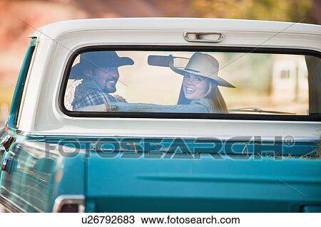 Couple in truck View Large Photo Image Stock Image - Couple in truck. Fotosearch