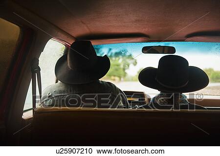 Cowboy and cowgirl in truck View Large Photo Image Stock Image - Cowboy and cowgirl in truck. Fotosearch