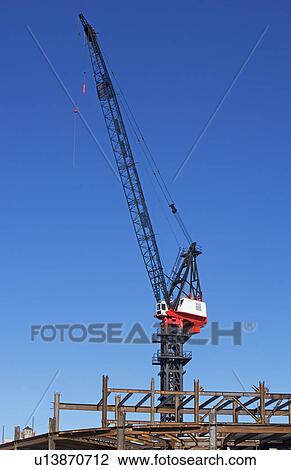 Crane at construction site View Large Photo Image Stock Image - Crane at construction site. Fotosearch