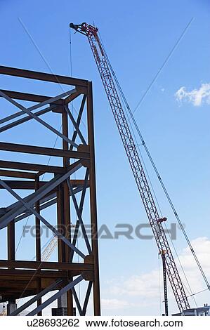 Crane at construction site View Large Photo Image Stock Image - Crane at construction site. Fotosearch