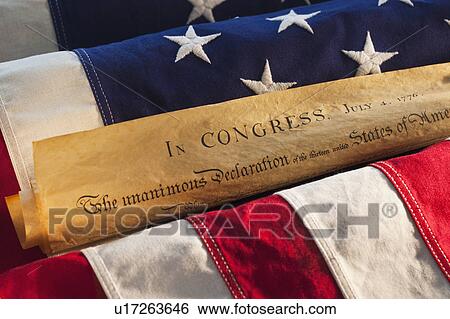 Declaration of Independence of top of American flag View Large Photo Image Stock Photograph - Declaration of Independence of top of American flag. Fotosearch