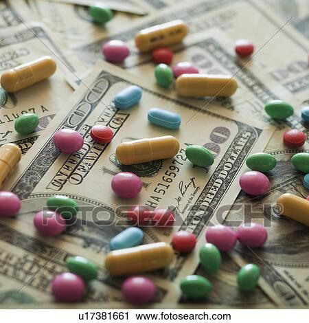 Diet pills and money View Large Photo Image Stock Image - Diet pills and money. Fotosearch
