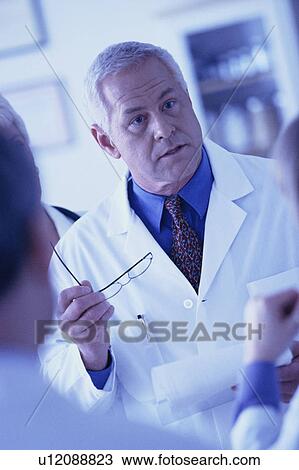 Doctor giving advice View Large Photo Image Stock Image - Doctor giving advice. Fotosearch