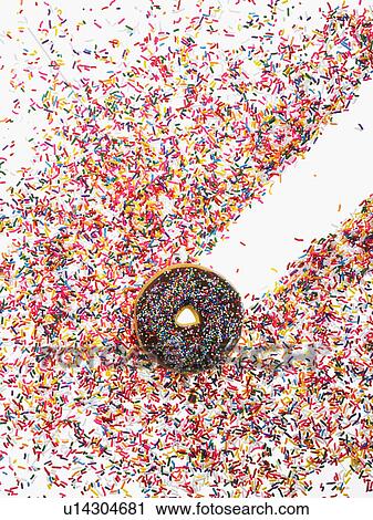 Stock Image - Donut and sprinkles. Fotosearch