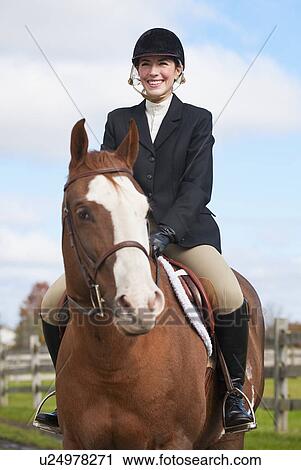 Stock Image - Equestrian rider. Fotosearch