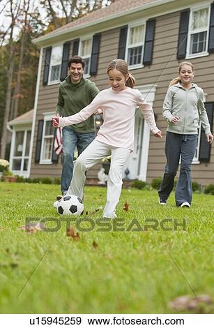 Family playing soccer View Large Photo Image Stock Photo - Family playing soccer. Fotosearch