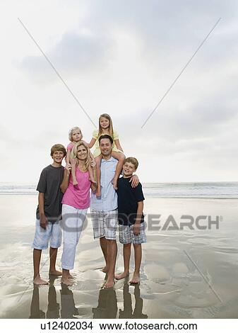 Family portrait at the beach View Large Photo Image Picture - Family portrait at the beach. Fotosearch