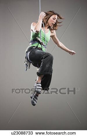 Female climber propelling View Large Photo Image Stock Image - Female climber propelling. Fotosearch
