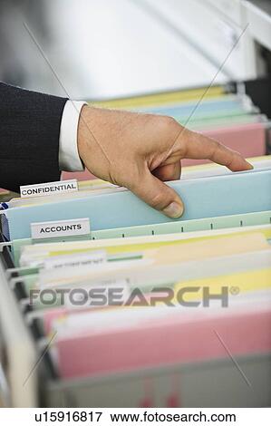 Stock Photo - Filing. Fotosearch