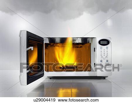 Fire in microwave View Large Photo Image Stock Photo - Fire in microwave. Fotosearch