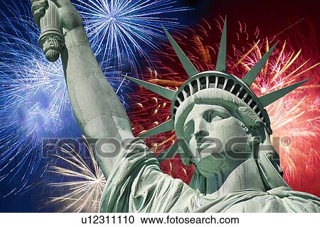 Stock Image - Fireworks behind statue of liberty. Fotosearch