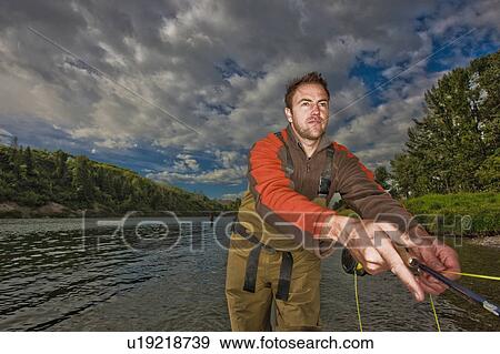 Fly fisherman View Large Photo Image Stock Photo - Fly fisherman. Fotosearch