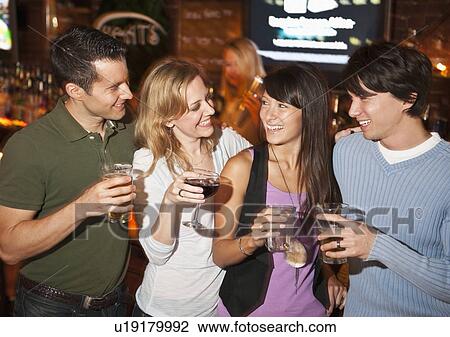 Stock Image - Friends at bar. Fotosearch