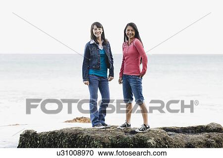 Friends at the ocean View Large Photo Image Stock Image - Friends at the ocean. Fotosearch