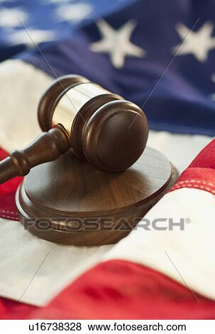 Gavel on top of American flag View Large Photo Image Stock Photo - Gavel on top of American flag. Fotosearch