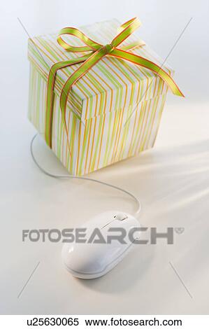 Stock Photography - Gift and computer mouse. Fotosearch