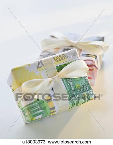 Stock Image - Gifts wrapped in money. Fotosearch