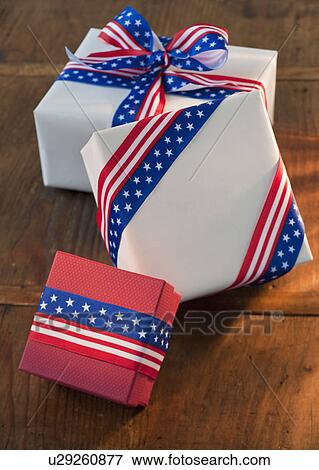 Gifts wrapped with Americana ribbons View Large Photo Image Stock Photo - Gifts wrapped with Americana ribbons. Fotosearch
