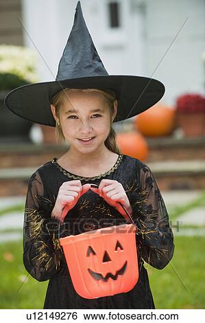 Stock Photograph - Girl dressed as witch. Fotosearch