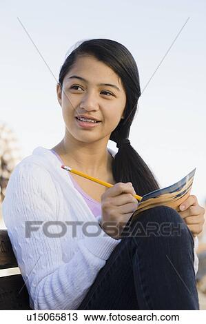 Girl writing View Large Photo Image Stock Image - Girl writing. Fotosearch