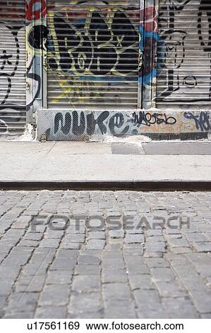 Stock Photo - Graffiti on urban street. Fotosearch