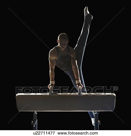Gymnast on pommel horse View Large Photo Image Stock Photo - Gymnast on pommel horse. Fotosearch