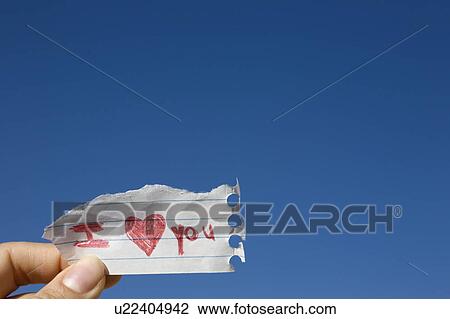 Hand holding note View Large Photo Image Stock Image - Hand holding note. Fotosearch