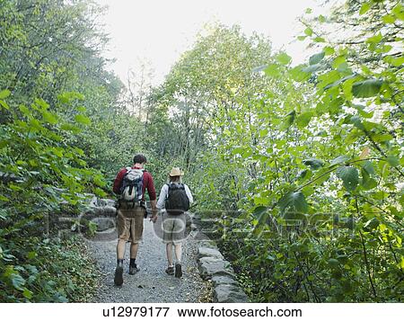 Hikers on path View Large Photo Image Stock Photo - Hikers on path. Fotosearch