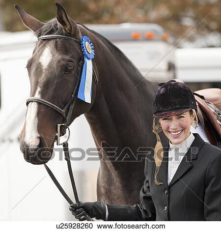 Horse wearing ribbon View Large Photo Image Stock Image - Horse wearing ribbon. Fotosearch