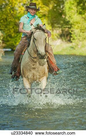 Stock Image - Horseback rider. Fotosearch