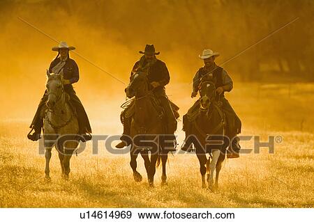 Stock Photo - Horseback riders. Fotosearch