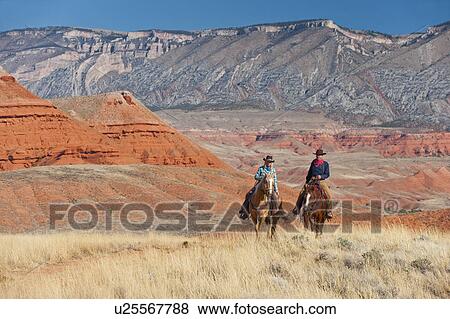 Horseback riders View Large Photo Image Stock Photo - Horseback riders. Fotosearch