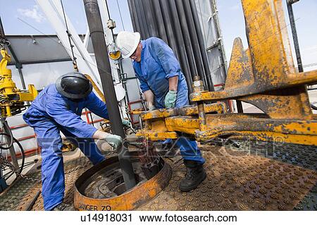 Stock Image - Industrial workers. Fotosearch