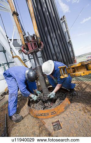 Stock Photo - Industrial workers. Fotosearch