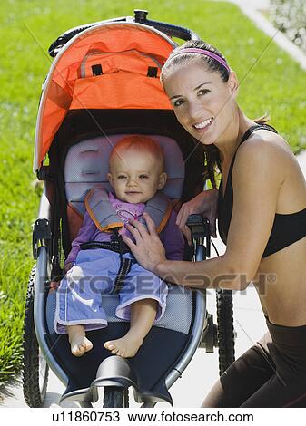 Stock Image - Jogger and baby. Fotosearch