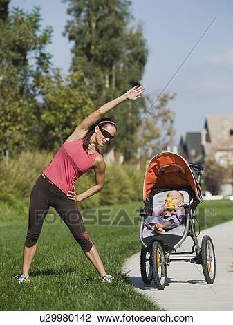 Stock Image - Jogger and baby. Fotosearch