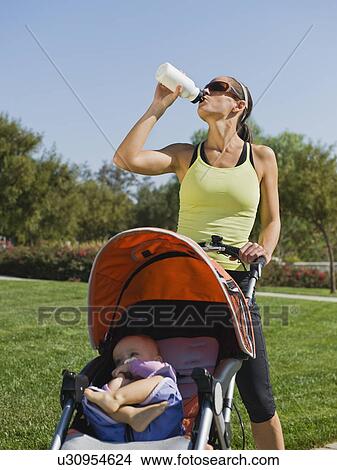 Picture - Jogger drinking water. Fotosearch