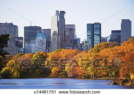Stock Image - Lake and high-rise buildings. Fotosearch